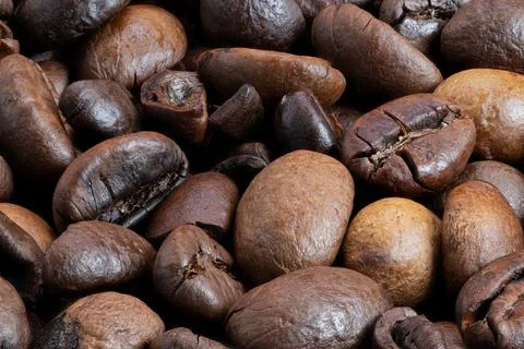 Coffee bean closeup, Closeup of matte roasted coffee beans with intricate detail Stock Photos