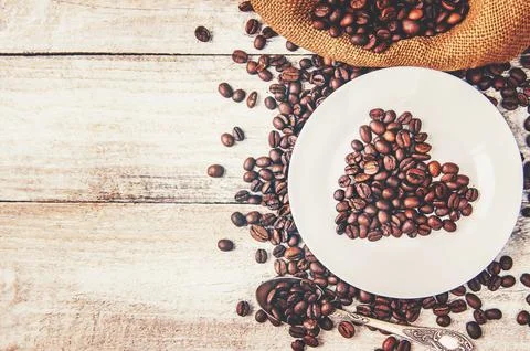 Coffee bean. a Cup of coffee. selective focus. Stock Photos