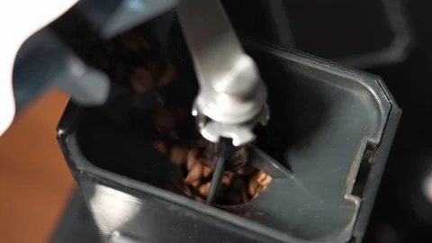 Coffee bean dropping to grinder for dripping, slow motion  Stock Footage 123574225