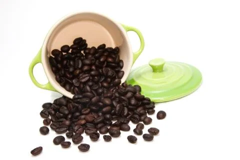 Coffee bean in green pot Stock Photos