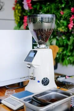 Coffee bean grinder. Using a quality coffee grinder will produce perfectly fine. Stock Photos