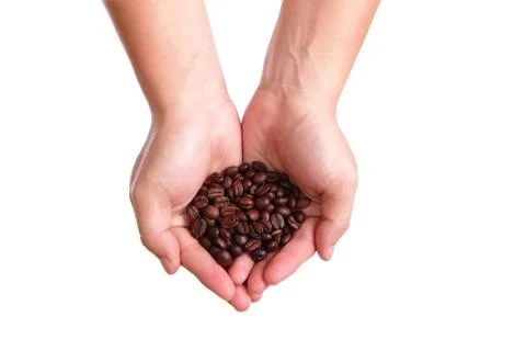 Coffee Bean in the hand Stock Photos