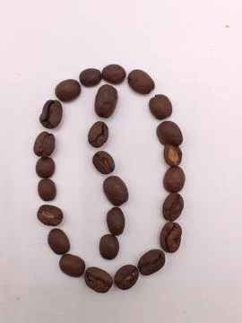 Coffee bean imitation shape decor on white background Stock Photos