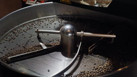 Coffee Bean Roasting Machine in Action with Cascading Beans 库存影片 307597390