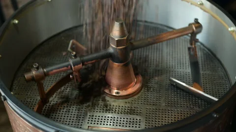 Coffee bean is roasting in roaster machine Stock Footage 137255398