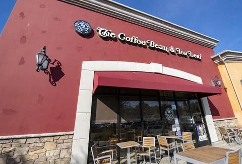 The Coffee Bean Tea and Leaf store front entrance. Close up logo Stock Photos