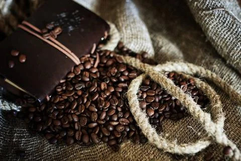 Coffee bean on textile background coffee bean on textile background ,model... Stock-Fotos