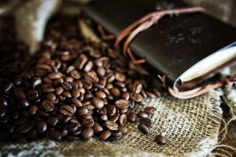Coffee bean on textile background Stock Photos