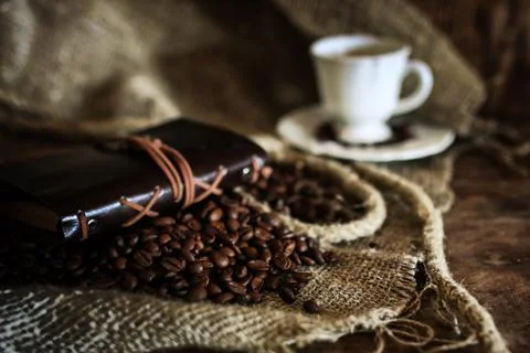 Coffee bean on textile background Stock Photos