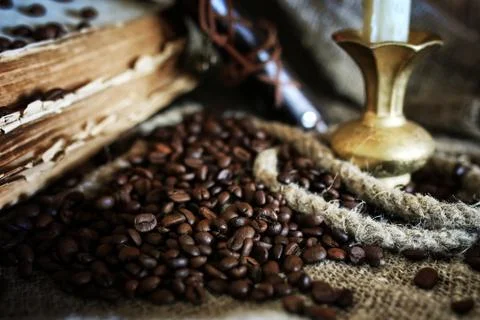 Coffee bean on textile background Stock Photos