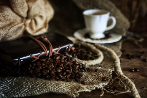 Coffee bean on textile background Stock Photos