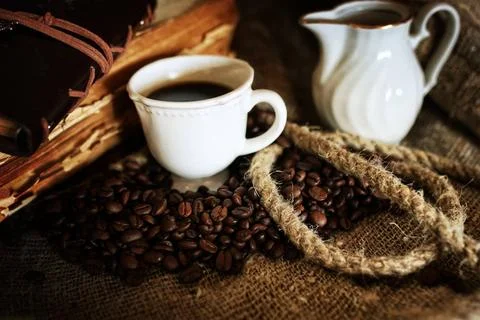 Coffee bean on textile background various vintage elements on old worn bac... Stock-Fotos
