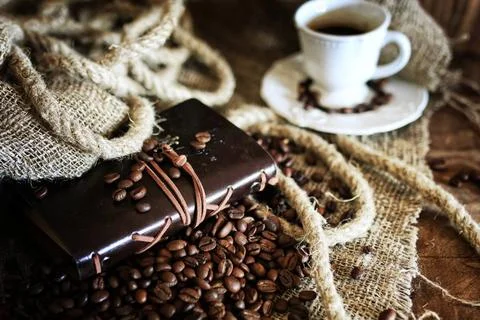 Coffee bean on textile background various vintage elements on old worn bac... Stock-Fotos