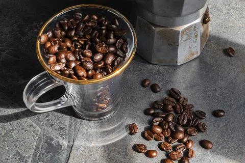 Coffee bean texture on stone background copy space. Stock Photos