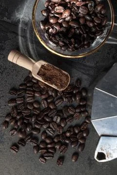 Coffee bean texture on stone background copy space. Stock Photos