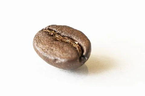 Coffee bean on white background. macro photo of fried brown coffee beans on t Stock Photos