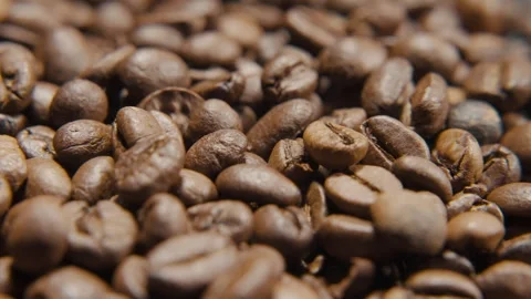 Coffee beans in 360 degree rotating showcase macro shot Video stock 263919915