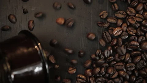 Coffee Beans 4k Poured Onto Black Surface - Slow Motion - Morning, Energy, Food Stock Footage 154471318