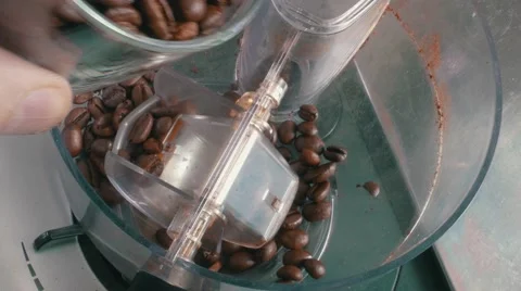 Coffee Beans Added to the Grinder Stock Footage 53368661