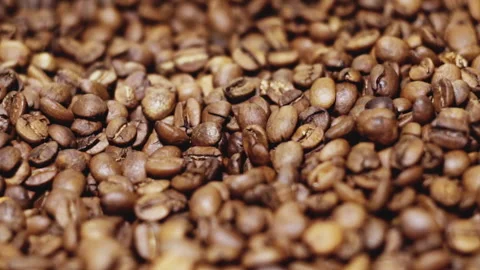 Coffee beans after roasting on roasting - close up Stock-Footage 94349360