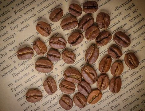 Coffee beans and book Stock Photos