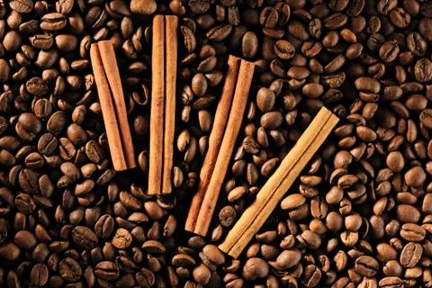 Coffee beans and cinnamon Stock Photos