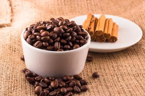 Coffee beans and cinnamon Stock Photos