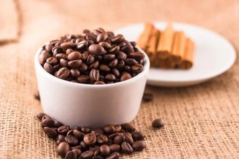 Coffee beans and cinnamon Stock Photos