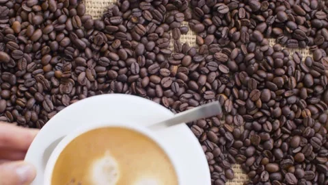 Coffee beans and cup of coffee Stock Footage 137027785