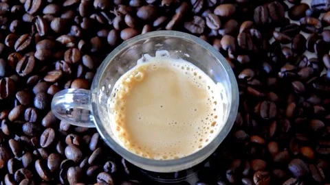 Coffee beans and cup Stock Footage 73961585
