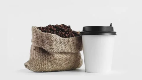 Coffee beans and cup Stock Footage 203934044