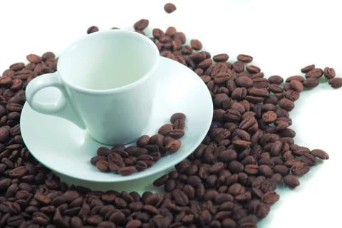 Coffee beans and cup Stock Photos
