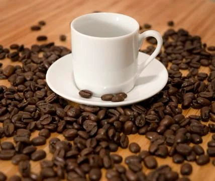 Coffee Beans and Cup Stock Photos