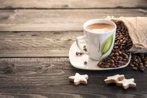 Coffee beans and cup Stock Photos