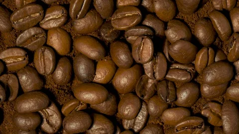 Coffee beans and ground coffee rotating Vídeos de archivo 128707622