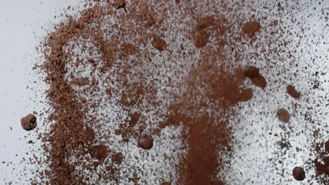 Coffee Beans And Grounds Are Shooting Into The Air Stock Footage 254998257