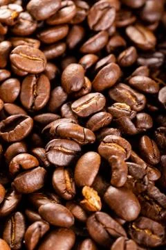 Coffee Beans and Grounds Close up. Background. Stock Photos