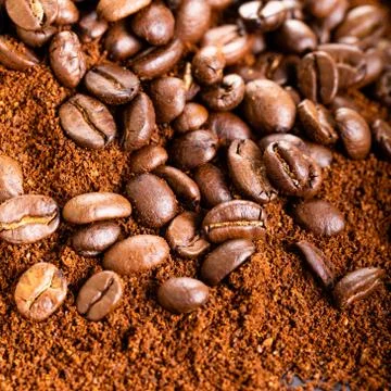 Coffee Beans and Grounds Close up. Background. Stock-Fotos
