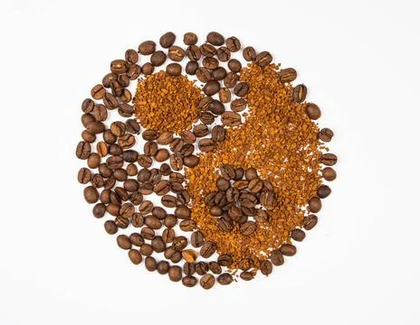 Coffee beans and instant cocoa yin-yang close up Stock Photos