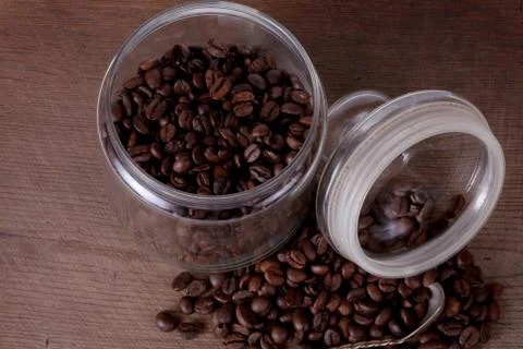 Coffee beans and jar Stock Photos