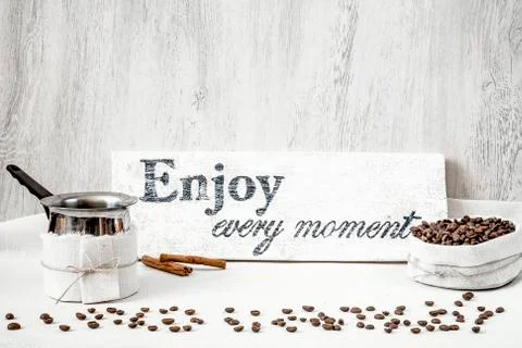 Coffee beans and pitcher for making coffee Stock Photos