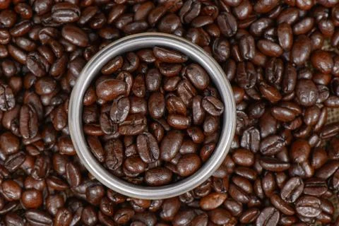 Coffee beans and stainless filter Stock Photos