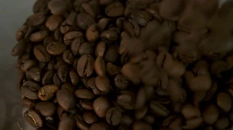 Coffee beans are being filled in coffee grinder in slow motion Stock Footage 59006523