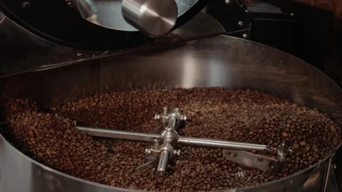 Coffee beans are being mixed and dried. Stock Footage 107991402
