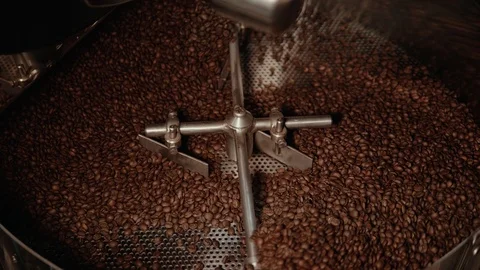 Coffee beans are being mixed and dried. Stock Footage 111066582