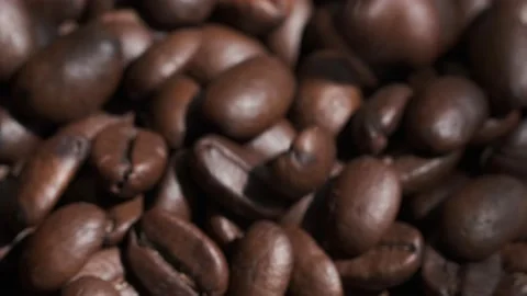 Coffee beans are falling, slow motion. Coffee beans roasted close-up.Vietnamese  Stock Footage 155119089