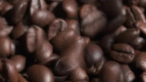 Coffee beans are falling, slow motion. Coffee beans roasted close-up.Vietnamese  Stock Footage 155119487