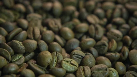 Coffee beans are ground in a coffee machine to make espresso. Close Up Stock Footage 323560579
