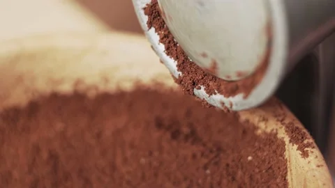 Coffee beans are ground in a manual coffee grinder. Stock Footage 140192998