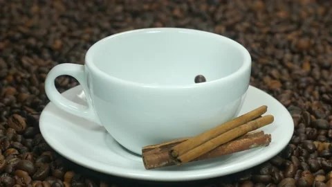 Coffee beans are poured into the cup Stock-Footage 108610654